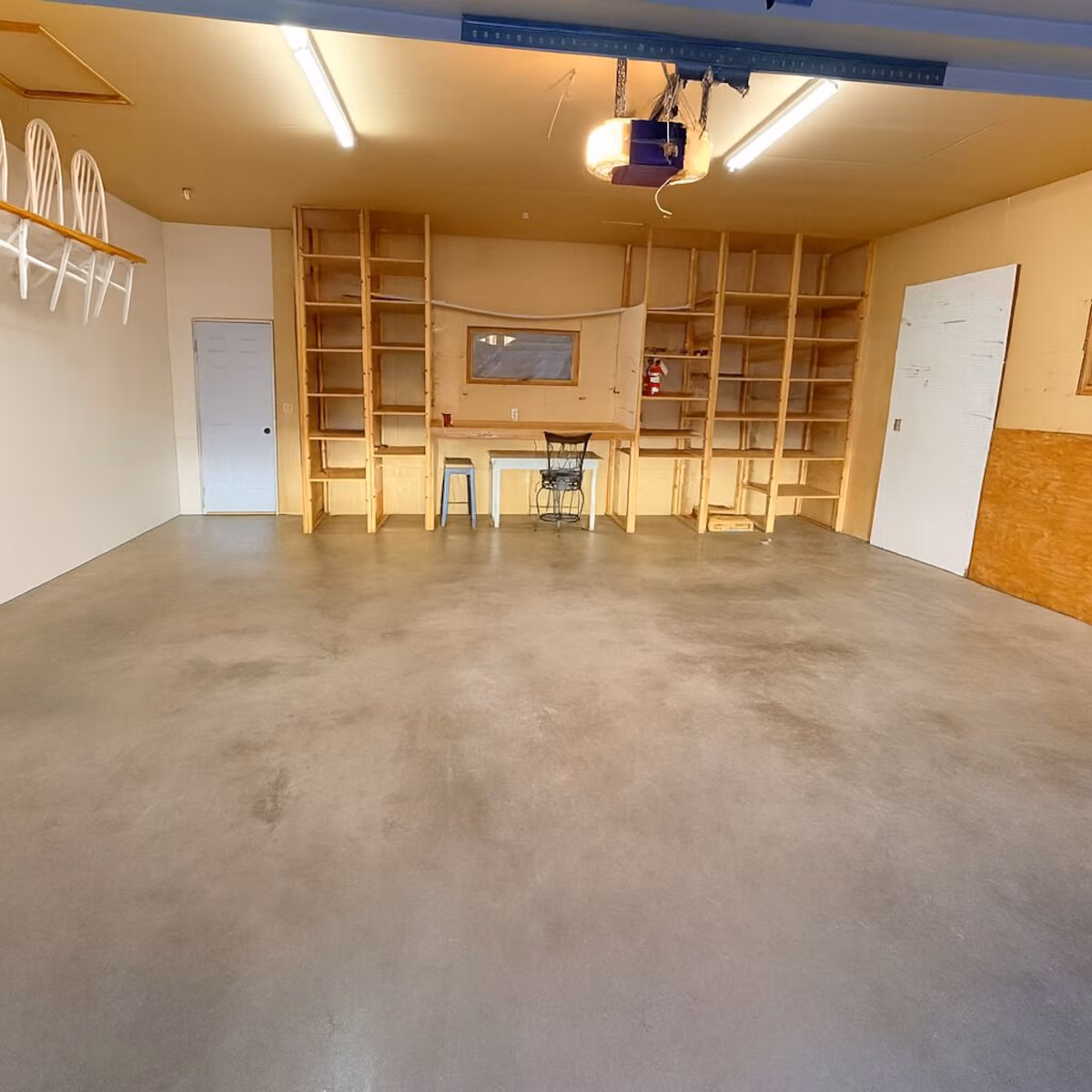 2 car attached garage with EV charger inside and RV hookups outside